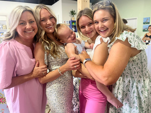 Mothers an daughters smiling and hugging 