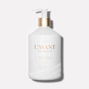 White bottle with pump labeled 'L'Avant Collective' on a light gray background