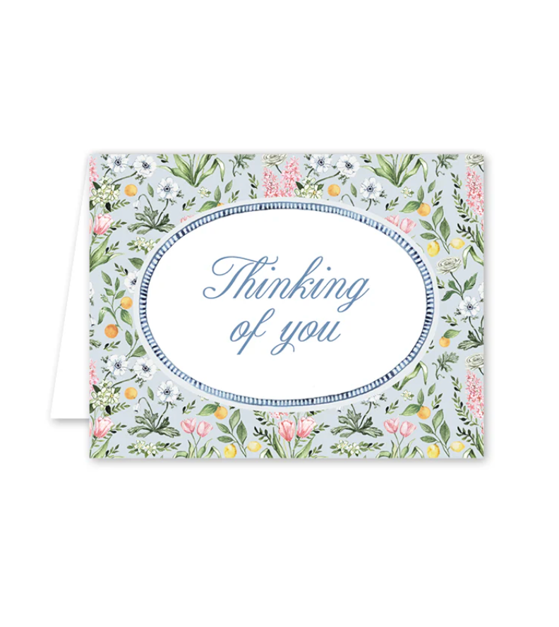 Floral card with 'Thinking of you' text on a white background