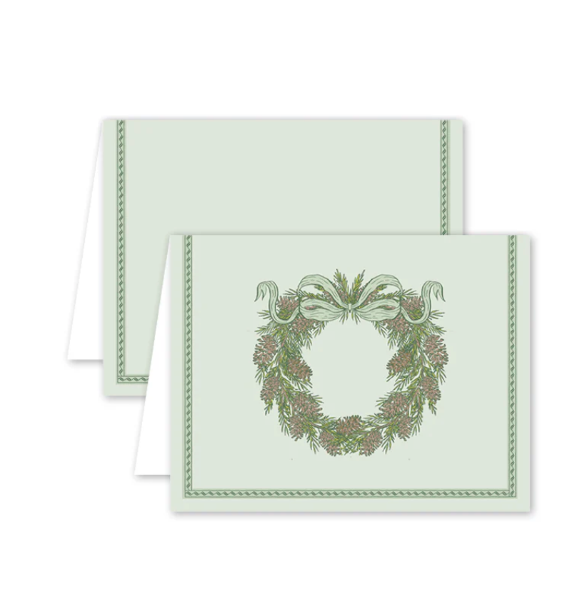 Greeting card with wreath design on a white background