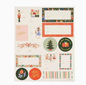 Collection of Christmas-themed adhesive labels including cards and labels on a white background.