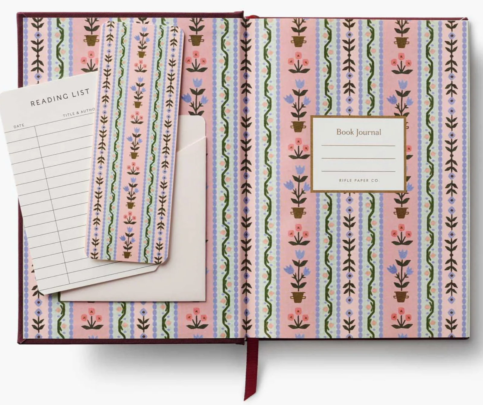 Patterned book journal with a reading list on a white background