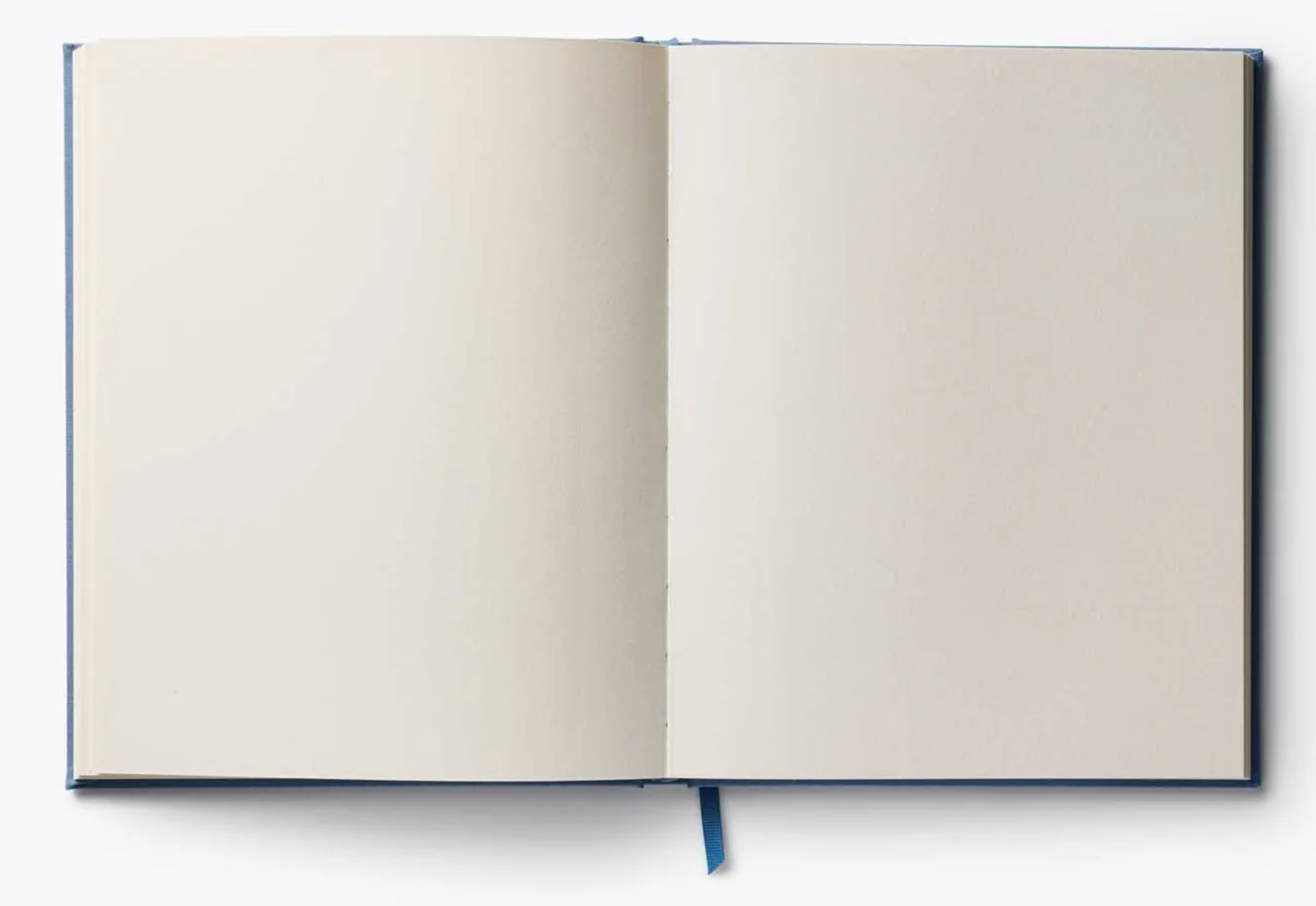 Open notebook with blank pages on a white background