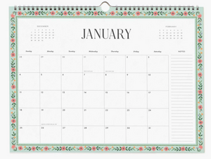 Calendar with floral border showing January on a white background