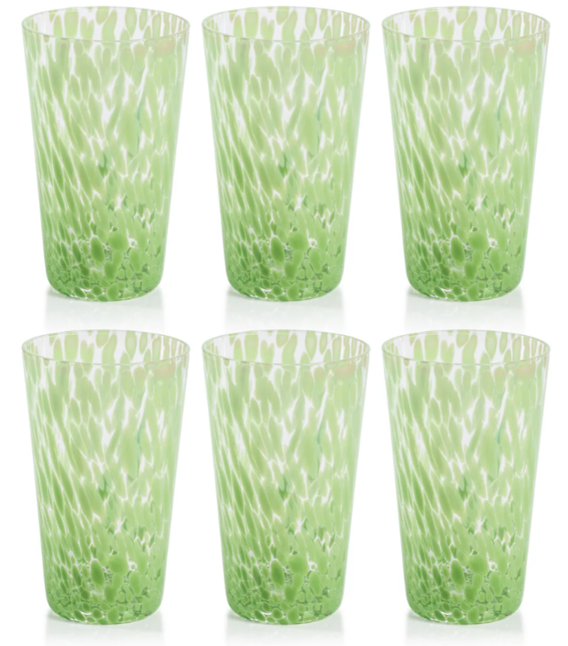 Set of six green patterned tumblers on a white background
