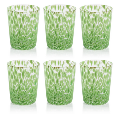 Set of six green and white patterned glass tumblers on a white background