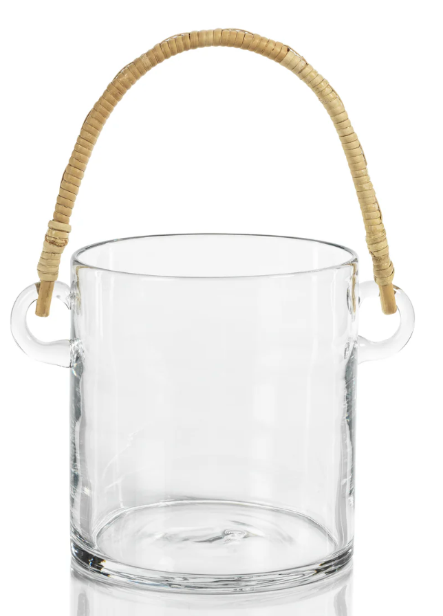 Clear glass vase with a woven handle on a white background