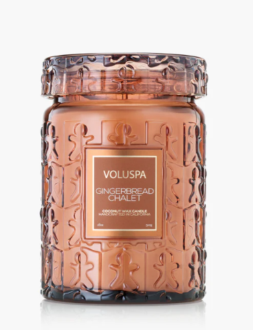 Voluspa Gingerbread Chalet candle in a decorative glass jar on a white background