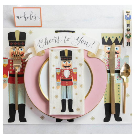 Christmas-themed cutlery set with nutcracker design on a white background