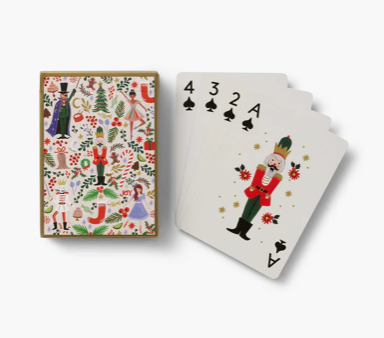 Playing cards with festive design on a white background