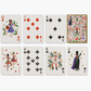 Set of playing cards with decorative designs on a white background