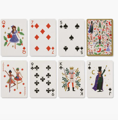 Set of playing cards with decorative designs on a white background