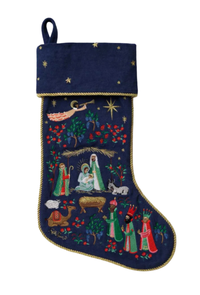 Embroidered Christmas stocking with nativity scene design on a white background