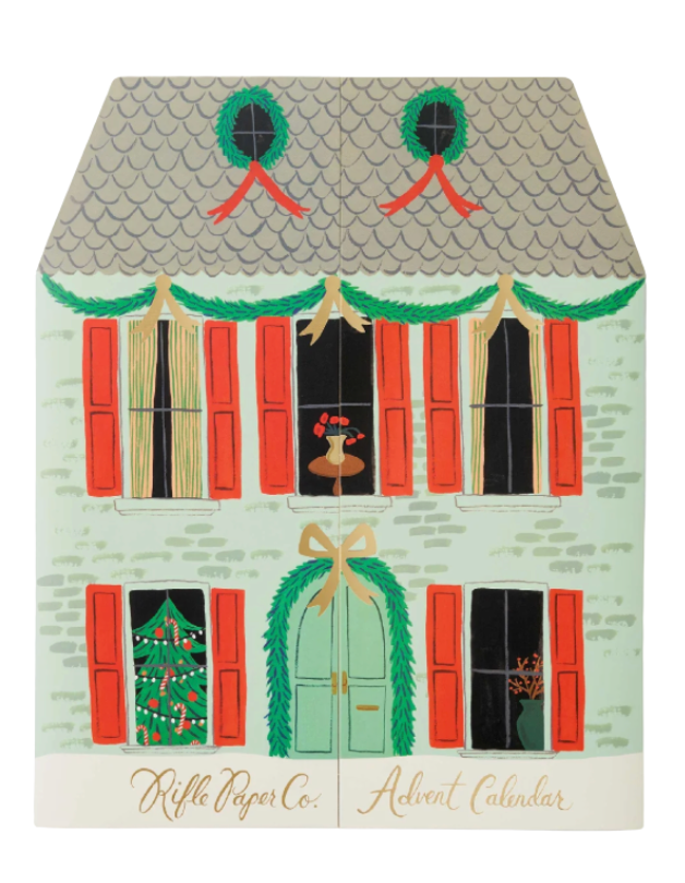 Rifle Paper Co. advent calendar with a festive house design on a white background