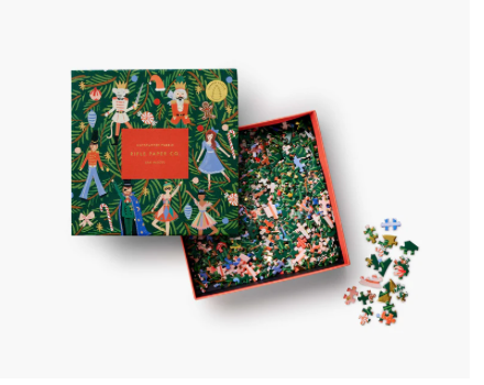 Jigsaw puzzle set with decorative box featuring illustrations of people and nature on a white background.