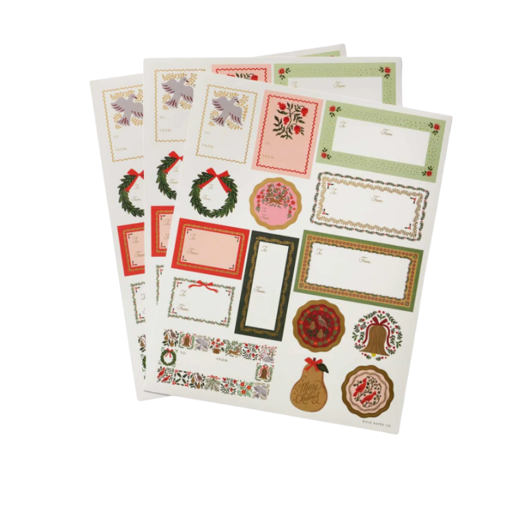 Set of decorative paper sheets with Christmas-themed designs on a white background