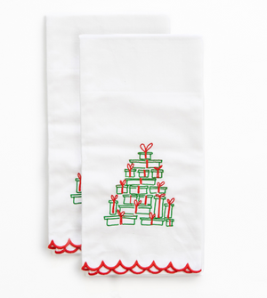 White towels with Christmas tree design on a white background