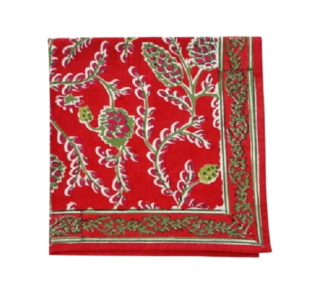 Red fabric with green and white floral pattern on a white background