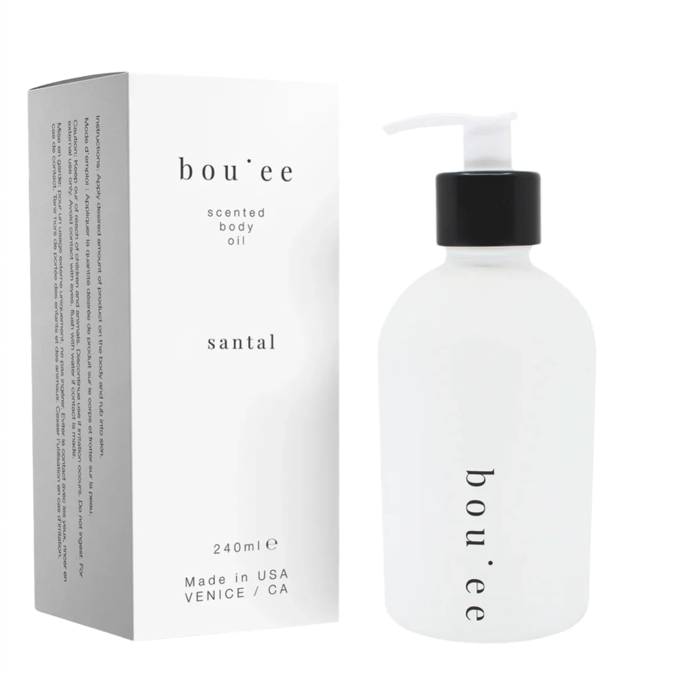 Bouèe scented body oil bottle and packaging on a white background