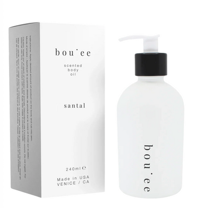 Bouèe scented body oil bottle and packaging on a white background