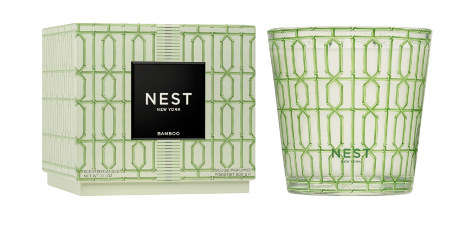 Green candle with geometric pattern and matching box, featuring the NEST brand.