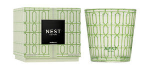 Green candle with geometric pattern and matching box, featuring the NEST brand.