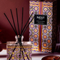 NEST New York Moroccan Amber diffuser with decorative packaging on a dark background