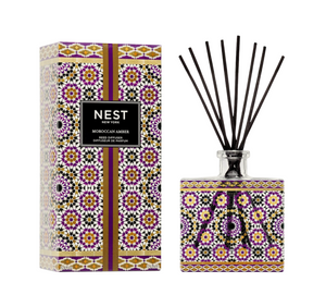 NEST New York Moroccan Amber diffuser with decorative packaging on a white background