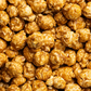 Close-up of caramel popcorn with a focus on texture and color.
