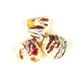 Three dessert items with chocolate and white drizzle on a white background