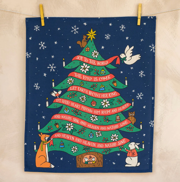 Decorative Christmas tree towel with festive design on a beige background