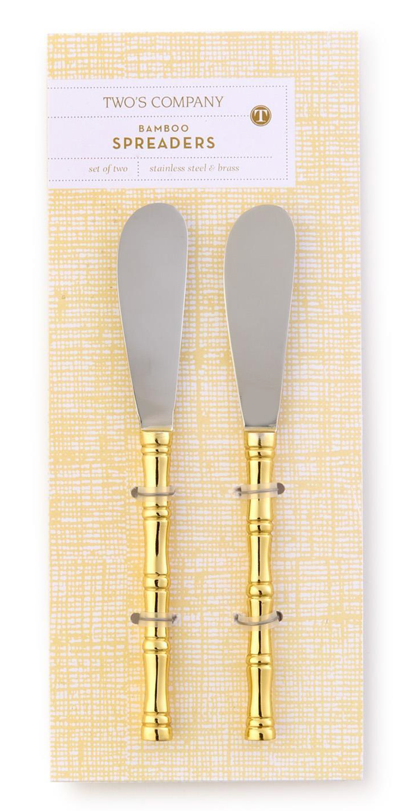 Two bamboo spreaders with gold accents in packaging on a white background