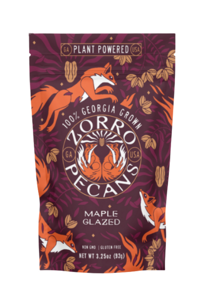 Zorro Pecans maple glazed pecans packaging with fox illustrations on a purple background