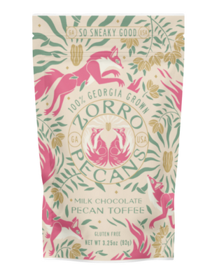 Zorro Pecans milk chocolate pecan toffee packaging with fox illustrations on a light background