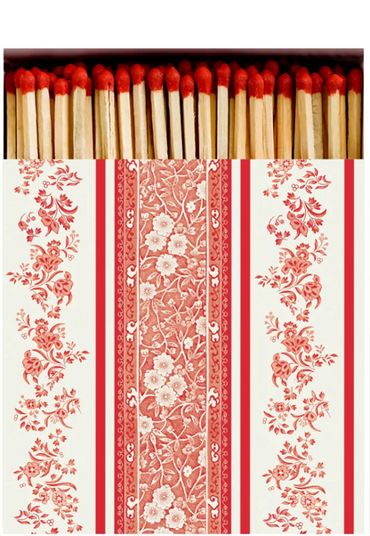 Matches in a decorative box with floral and striped pattern